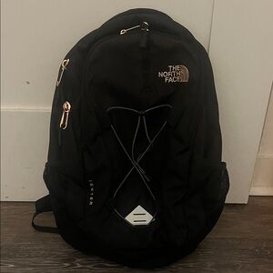 The North Face Black Backpack with Rose Gold Accents